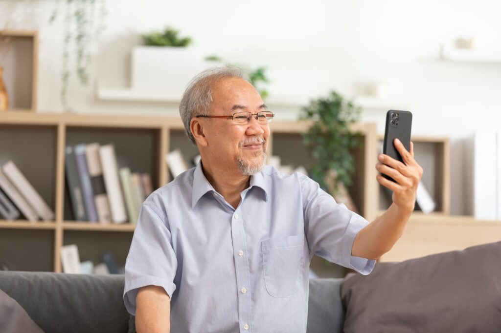 long distance grandfather videocalling his grandchildren